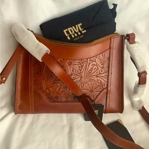 Brand new w tags. Embossed cognac leather.